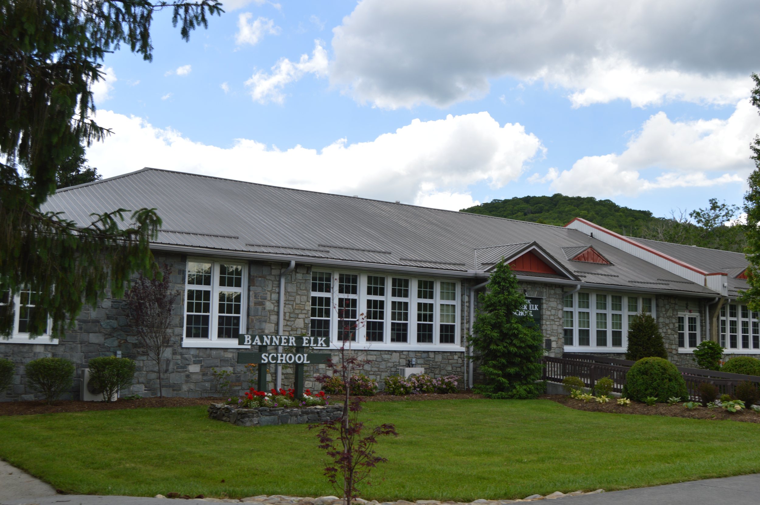 Stone facade and entrance of the former Banner Elk School