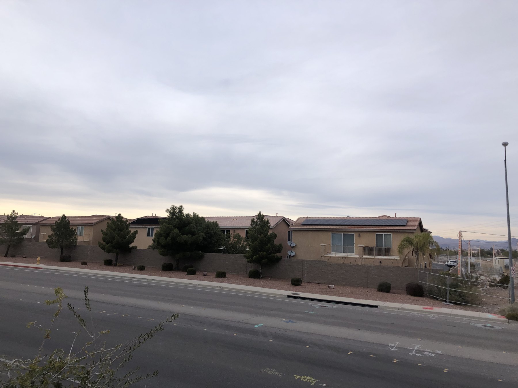 Residential neighborhood in Henderson, Nevada with desert mountains beyond